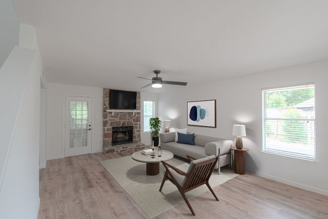 The living room greets you as you enter the home. | Image 4
