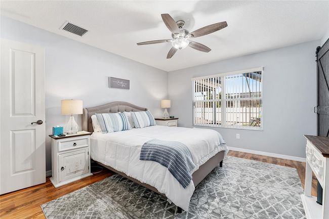 Primaty suite has view to pool area. Furnishings are optional. | Image 15