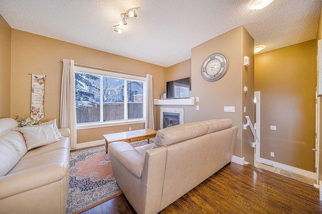 84 Bridleridge Manor Sw, Home with 3 bedrooms, 2 bathrooms and 1 parking in Calgary AB | Image 12
