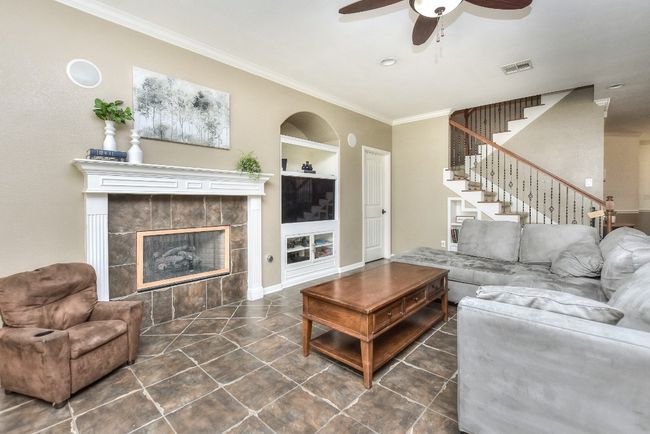 This open family room will accommodate a lot of furniture for your family & guests! | Image 10