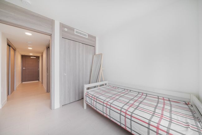 Bedroom with a closet and recessed lighting | Image 12