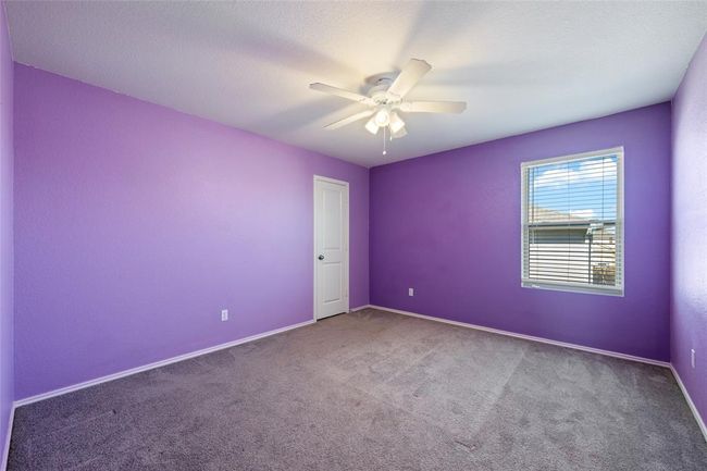 Carpeted spare room with ceiling fan and baseboards | Image 21