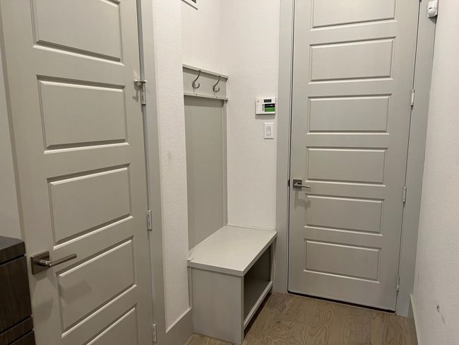 Mudroom leading to garage | Image 26