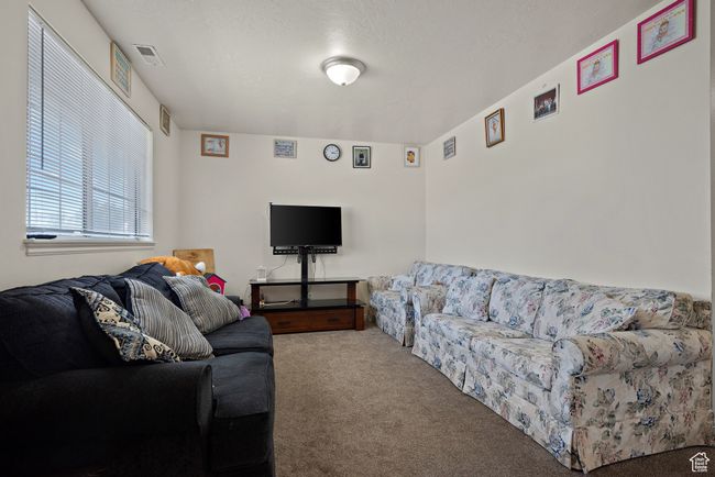 View of carpeted living area | Image 9
