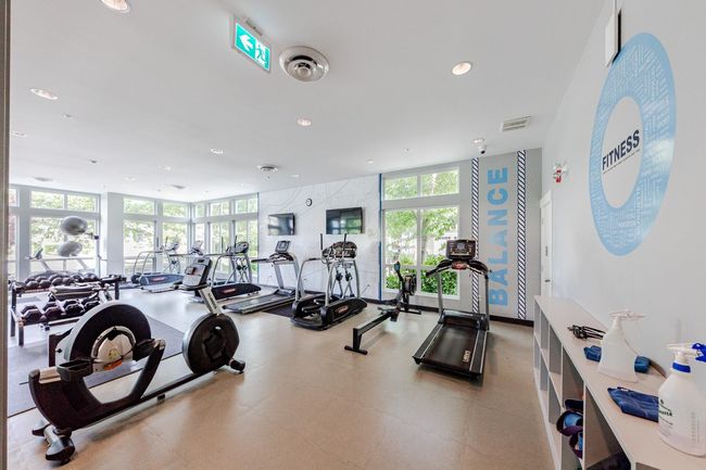Exercise room with plenty of natural light and recessed lighting | Image 39