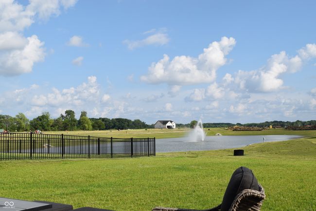 view of pond from patio | Image 10