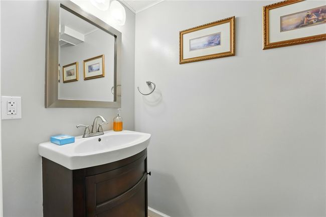 This is the 1/2 bath in the lower-level game room. | Image 22