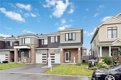 2283 Watercolours Way, Townhouse with 4 bedrooms, 4 bathrooms and 2 parking in Ottawa ON | Image 1