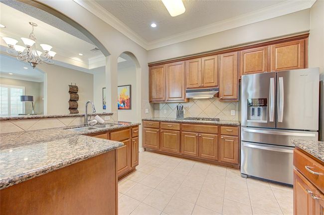 Super efficient kitchen with plenty of cabinets and SS appliances | Image 9