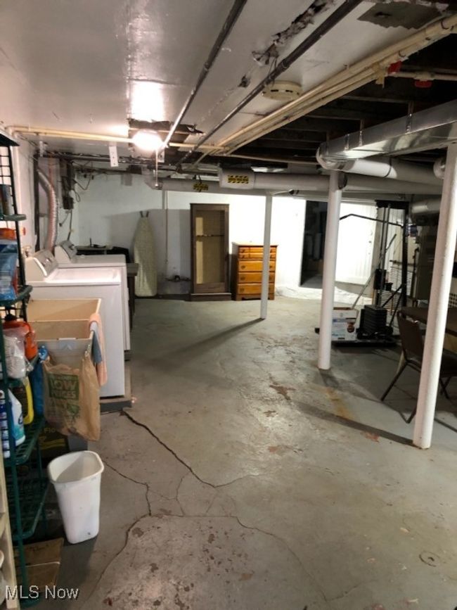 Basement featuring washing machine and clothes dryer | Image 33
