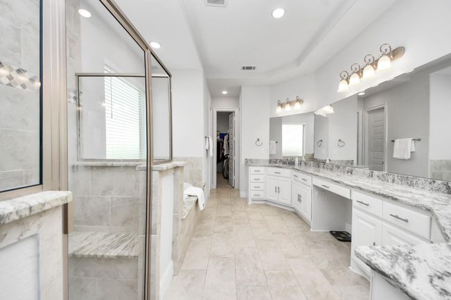 Primary / master bathroom - standing shower and spa tub | Image 28