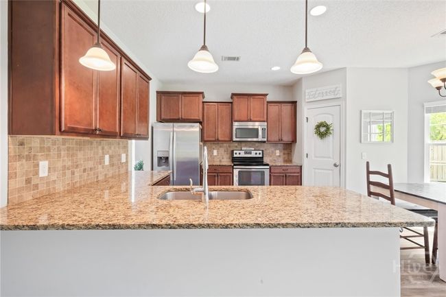 Stainless steel appliances stay with the home. | Image 14