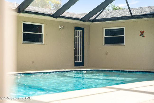 Separate Pool entrance from possible in law or guest suite. | Image 59
