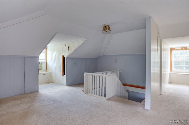 Additional living space featuring vaulted ceiling and carpet | Image 35