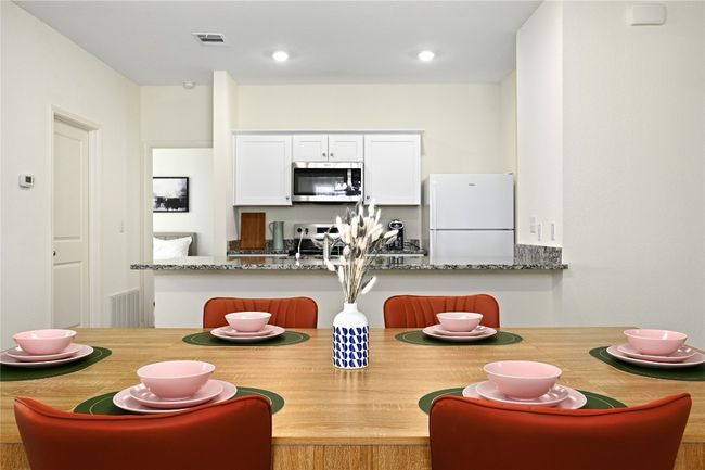 Dining room featuring visible vents and recessed lighting | Image 9