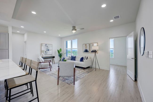 #921 FLOOR PLAN A. TILE THAT LOOKS LIKE WOOD COMES STANDARD IN THESE CONDOS. VERY HIGH END CARPETING WITH UPGRADED PAD IN BEDROOMS IS STANDARD. | Image 15