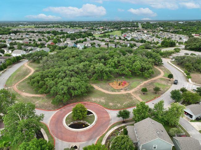 There are several parks all around Plum Creek with playgrounds and more, including this darling playscape near the home. | Image 23