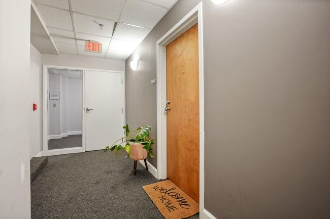 unit 105 off the back elevator, ONLY MEZZANINE UNIT additional convienent access to unit with enclosed room separating back elevator and unit, Back elevator is accessible from Elm St Alley, next to Buckeye Garage with call box and fob, goes straight to floor M, (Mezzanine) , & right off the elevator | Image 6