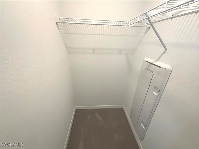 View of spacious closet | Image 10