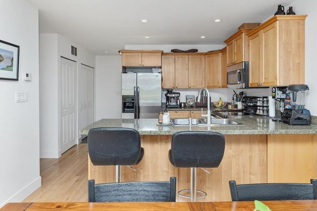 Kitchen island with bar seating | Image 14