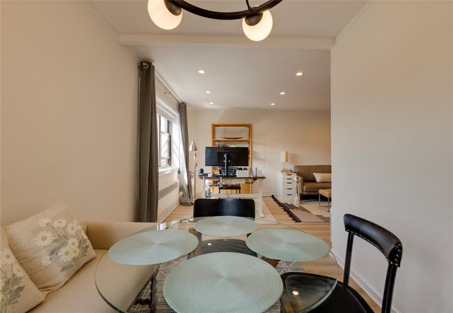 Dining space with recessed lighting, light wood-style flooring, and crown molding | Image 9