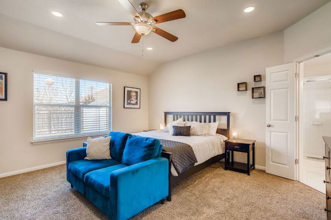 Bedroom featuring light colored carpet, recessed lighting, and ceiling fan | Image 16