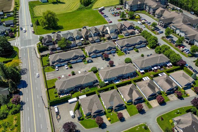 Aerial overview of property's location featuring nearby suburban area | Image 34