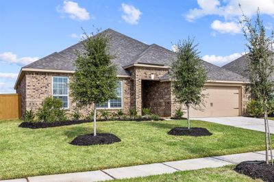 The Leland by LGI Homes. Completed example being built. Actual colors and finishes may vary from example photos. | Image 1