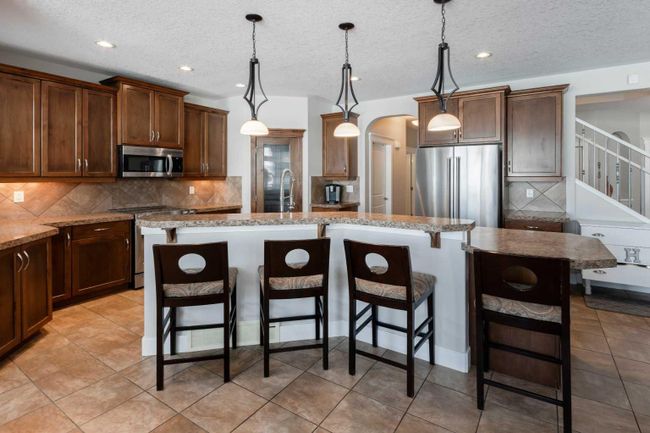 238 Kingsbury View Se, Home with 4 bedrooms, 3 bathrooms and 4 parking in Airdrie AB | Image 10