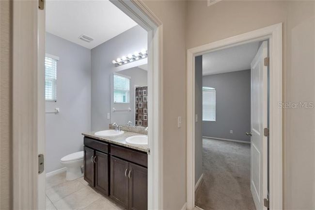 2nd Bathroom/bedroomwith wall to wall closet | Image 12