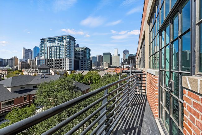 Balcony with a view of city | Image 14