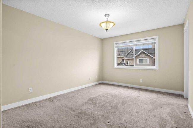 156 Rockyspring Grove Nw, Townhouse with 3 bedrooms, 3 bathrooms and 2 parking in Calgary AB | Image 25