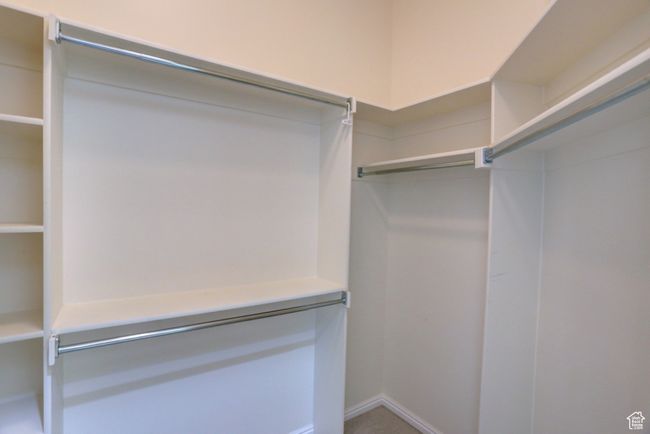 View of walk in closet | Image 12