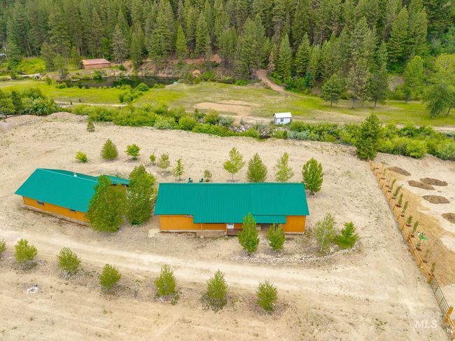 View from above of property with a heavily wooded area | Image 31