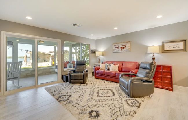 Living area featuring wood finished floors and recessed lighting | Image 17