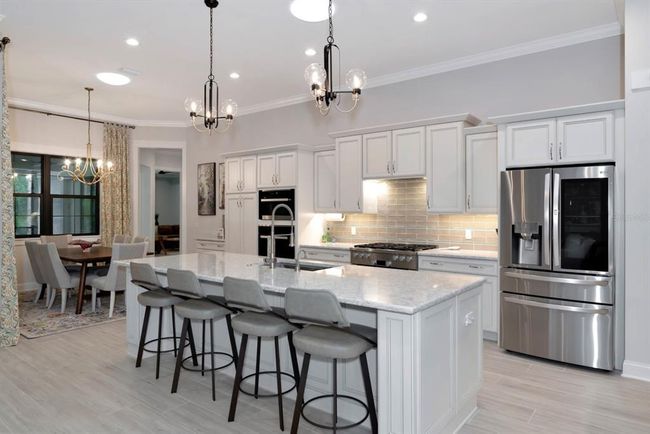Kitchen with LG Refrigerator | Image 9