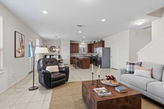 Living room with kitchen view | Image 6