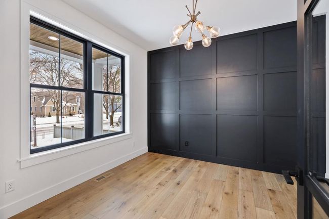 Main level office is great for telecommuting or running home business. Pictures of previously built house. | Image 7
