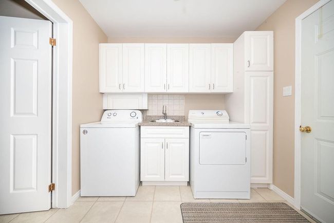 Works as a mudroom with garage entrance | Image 17