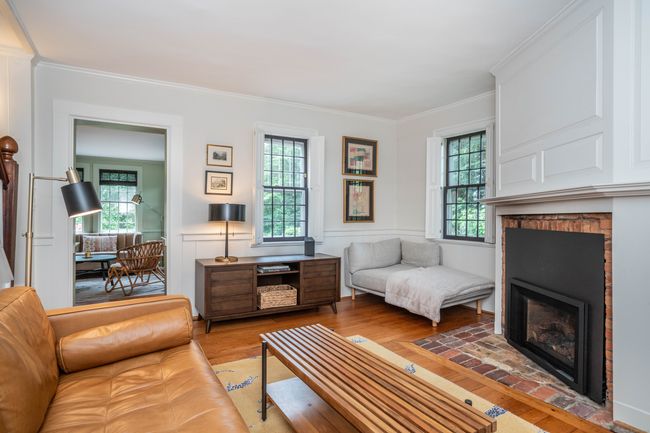 The cozy room could be the perfect place for a TV or an office. | Image 17