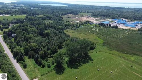 000 Quarterline Rd, Kewadin, MI, 49648 | Card Image