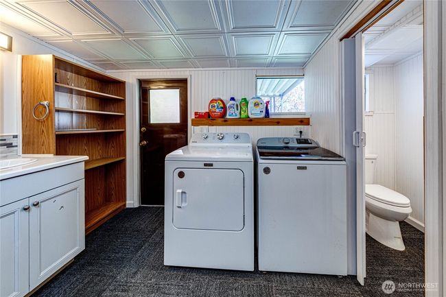 Laundry room and the 3/4 bath. | Image 26