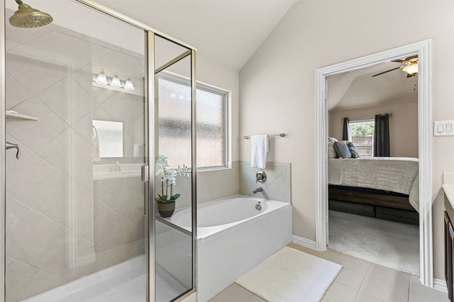Primary Bathroom with separate tub and walk in shower | Image 15