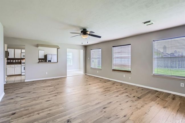 Spacious family room with a ton of natural light! | Image 11