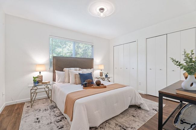 Primary bedroom offers view of backyard | Image 14