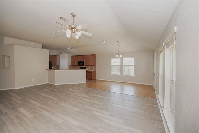 This home provides the perfect floor plan for those who love to entertain. | Image 8