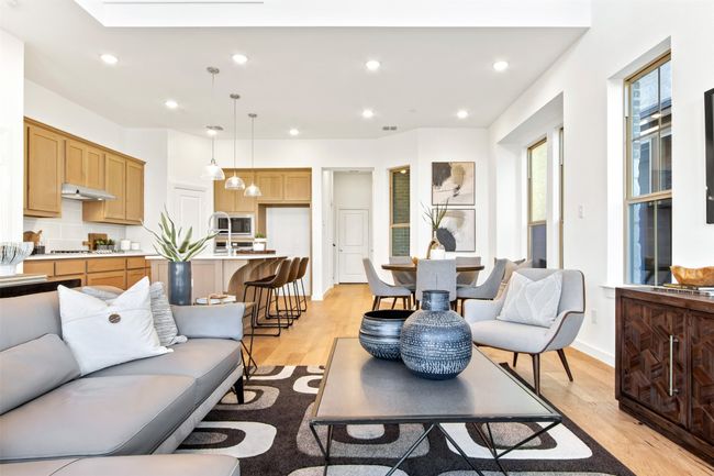 Living room featuring light wood-style floors and recessed lighting | Image 13