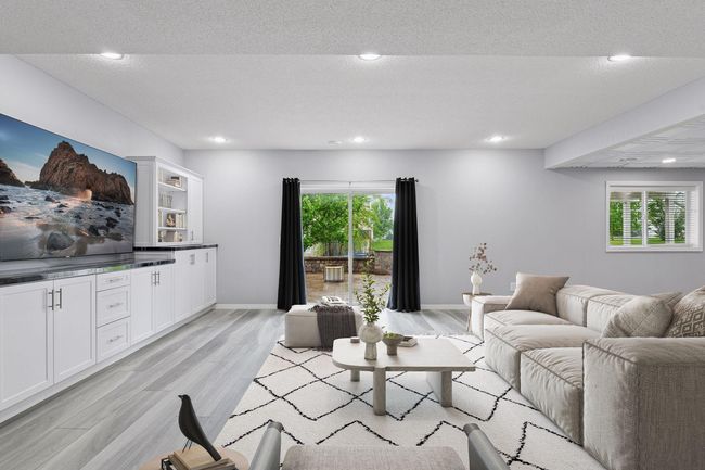 Walk out lower level leads to paver patio and large backyard | Image 20
