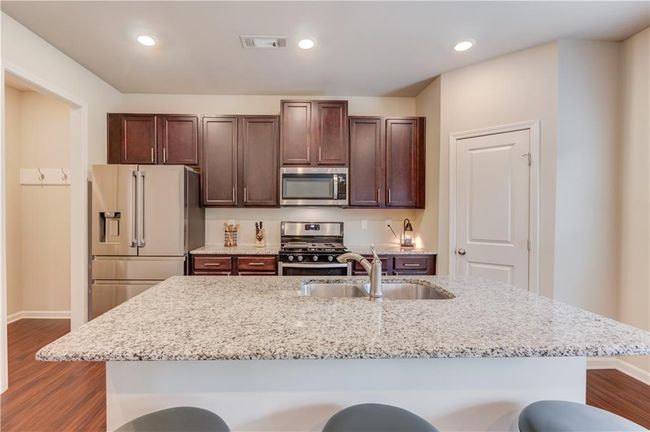 6841 Lancaster Xing, House other with 4 bedrooms, 3 bathrooms and 4 parking in Flowery Branch GA | Image 13