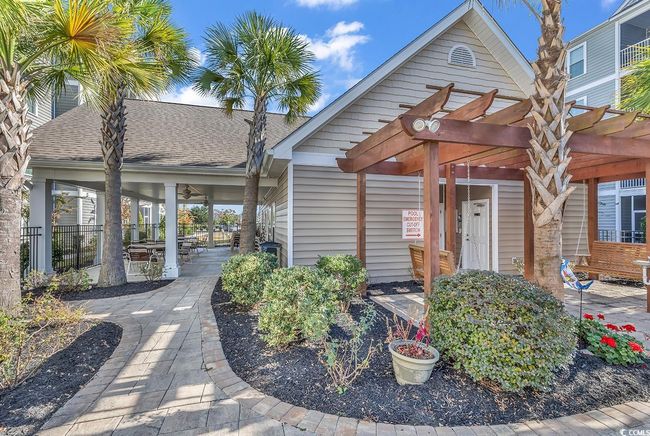 Community pool featuring a patio area | Image 11